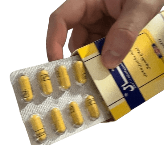 Ausgepackter Blister mit gelben Antinal Tabletten in Hand gehalten